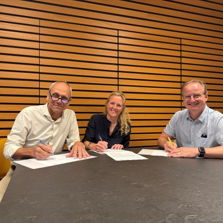 foto ondertekening fusie WYwonen WDA WSN