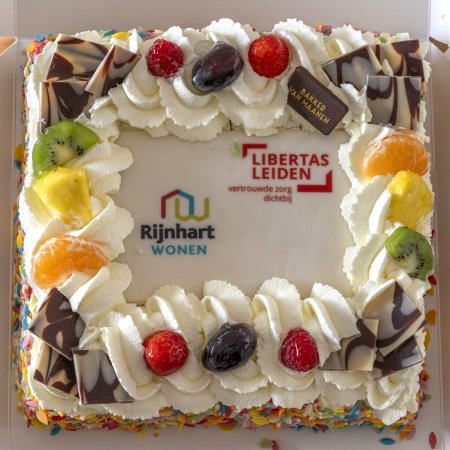Libertas Rijnhart Wonen samenwerking taart